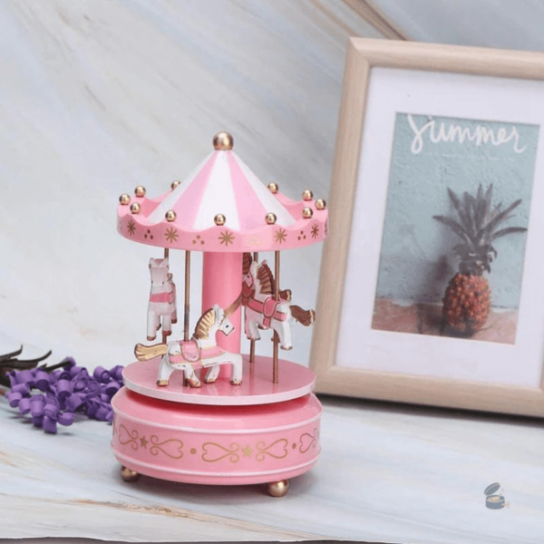 Carrousel musical en rose pour enfants