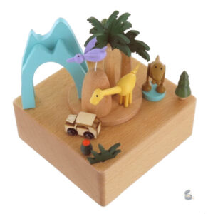 Décor coloré de l'île des dinosaures en boîte à musique