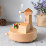 Boîte à musique artisanale avec thème de moulin