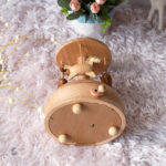 Carrousel en bois pour éveiller les sens des tout-petits